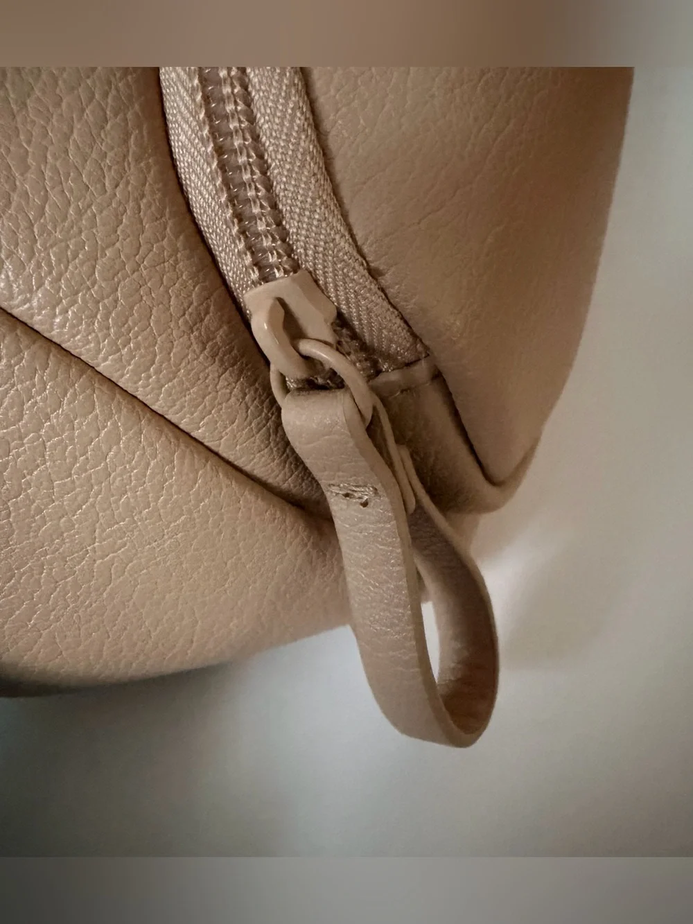 Cloud Island diaper sling in tan with checkered strap